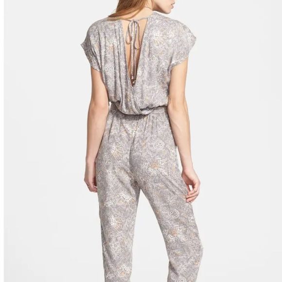 Free People Universal Surplice Floral Jumpsuit - Picture 1 of 8